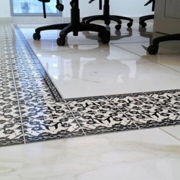 Hand decorated black and white tiles for the floor