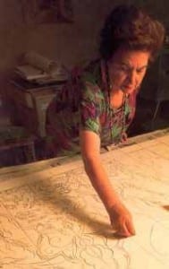 Marie Balian preparing one of her artistic tile paintings
