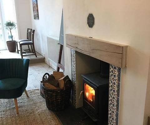 Simple hand decorated fireplace tiles