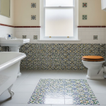 A custom vintage bathroom with Victorian tiles
