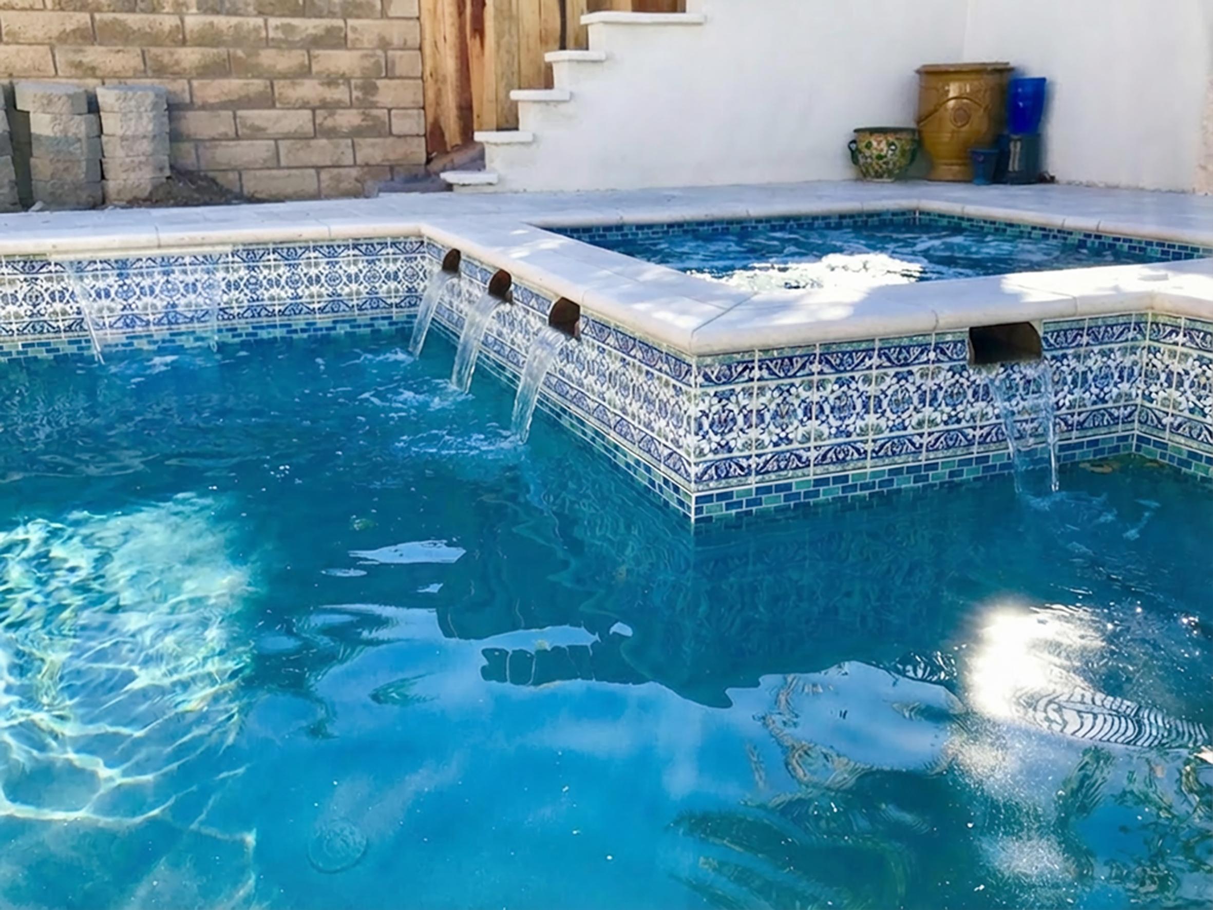 Balian Lori series 6x6 inch waterline tiles in a swimming pool and hot tub installation in the US